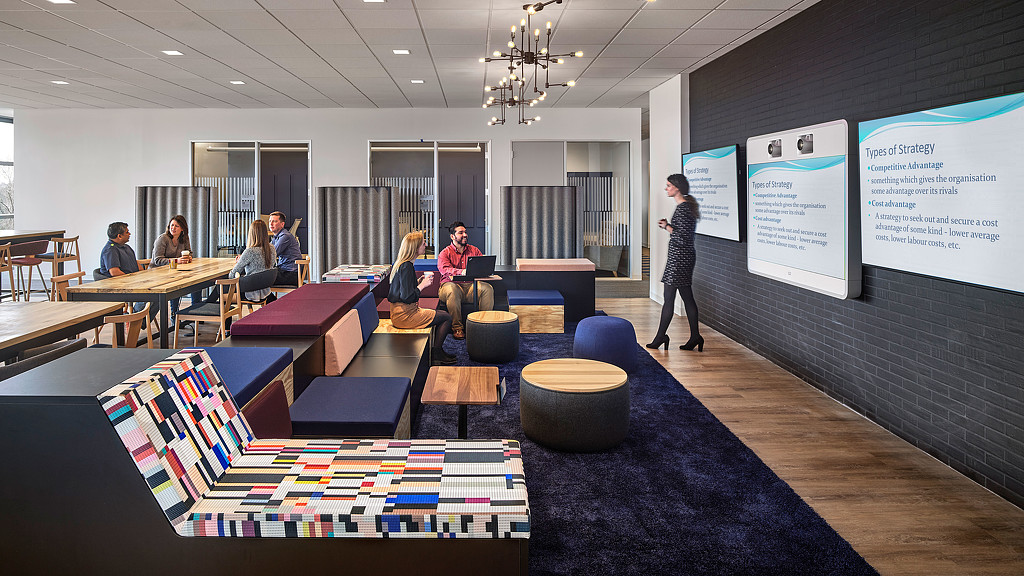 A group of people in a room.